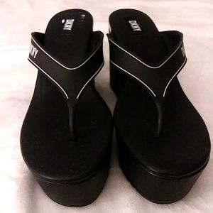 Selling, DKNY pair of shoe, the style is wages, and black in color.